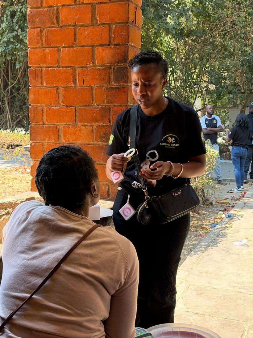 AFF staff member discussing HIV prevention options with a community member